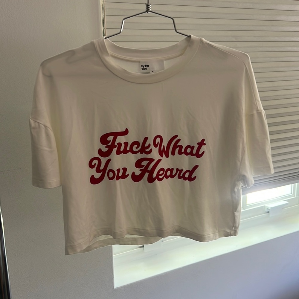 White T-Shirt Cropped with red writing on it. Purchased from Revolve. Size XS